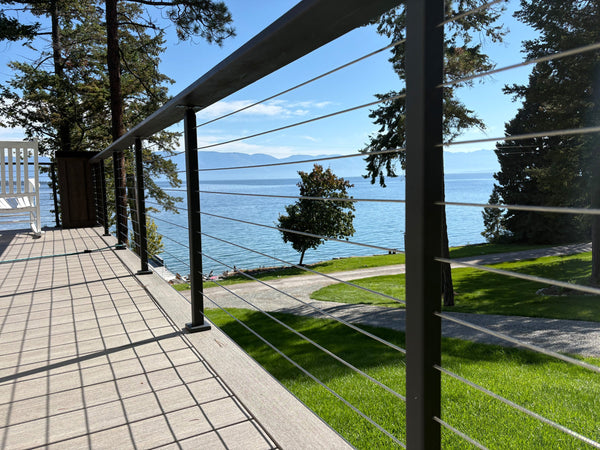 Black square-post cable railing and horizontal stainless-steel cables