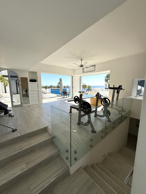 frameless interior glass railing with standoffs and wall handrail, Cabo San Lucas (22)